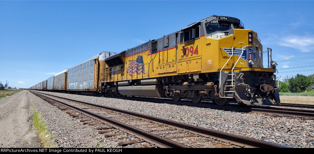 UP 3094 Starts to Slow down as The Lead Locomotive stops for A Crew change at the UP Cheyenne Depot